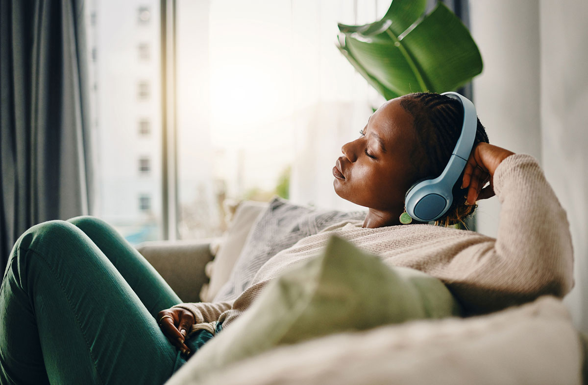 woman listening on headphones