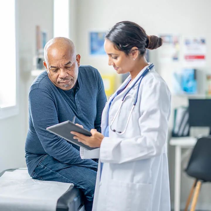 A patient talking to a doctor