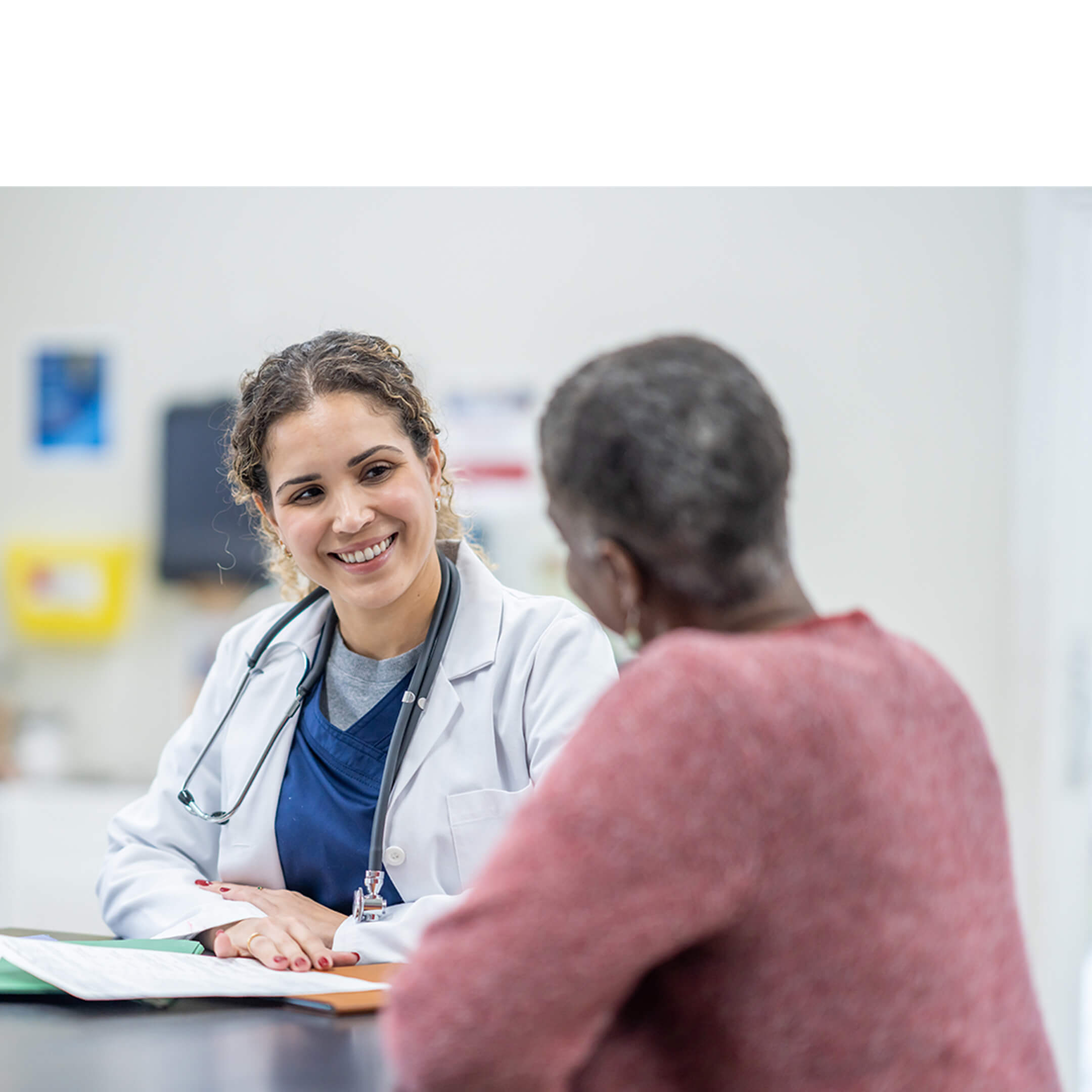 A patient talking to a doctor