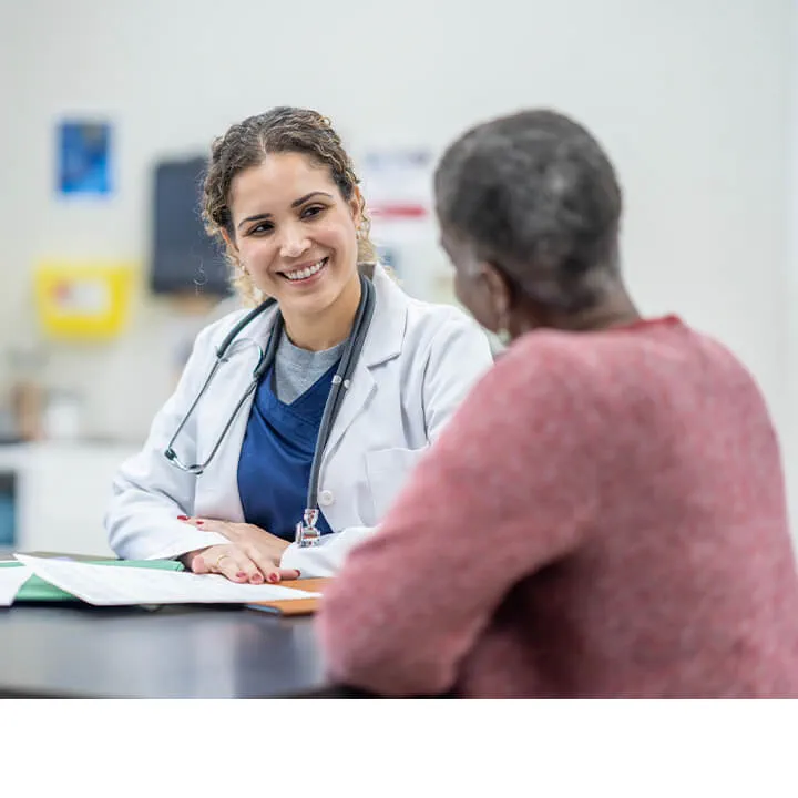 A patient talking to a doctor