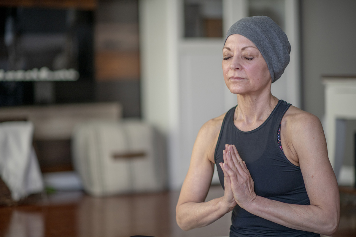 female cancer patient practicing mindfulness